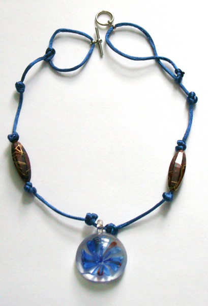 Beading: blue cord, blue flower pendant necklace