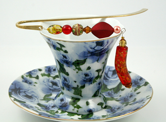 Bookmark red golden amber cup, med