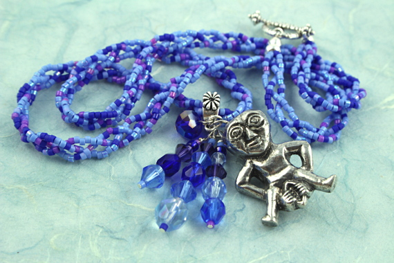 Sheela-na-gig necklace - purple and blue, heap, md